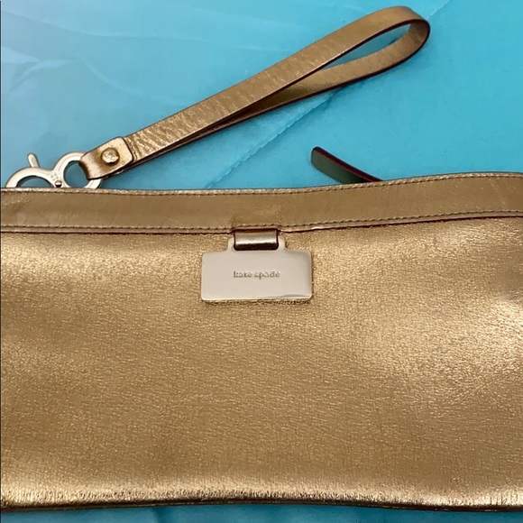 kate spade Handbags - Gold Kate spade cosmetic clutch